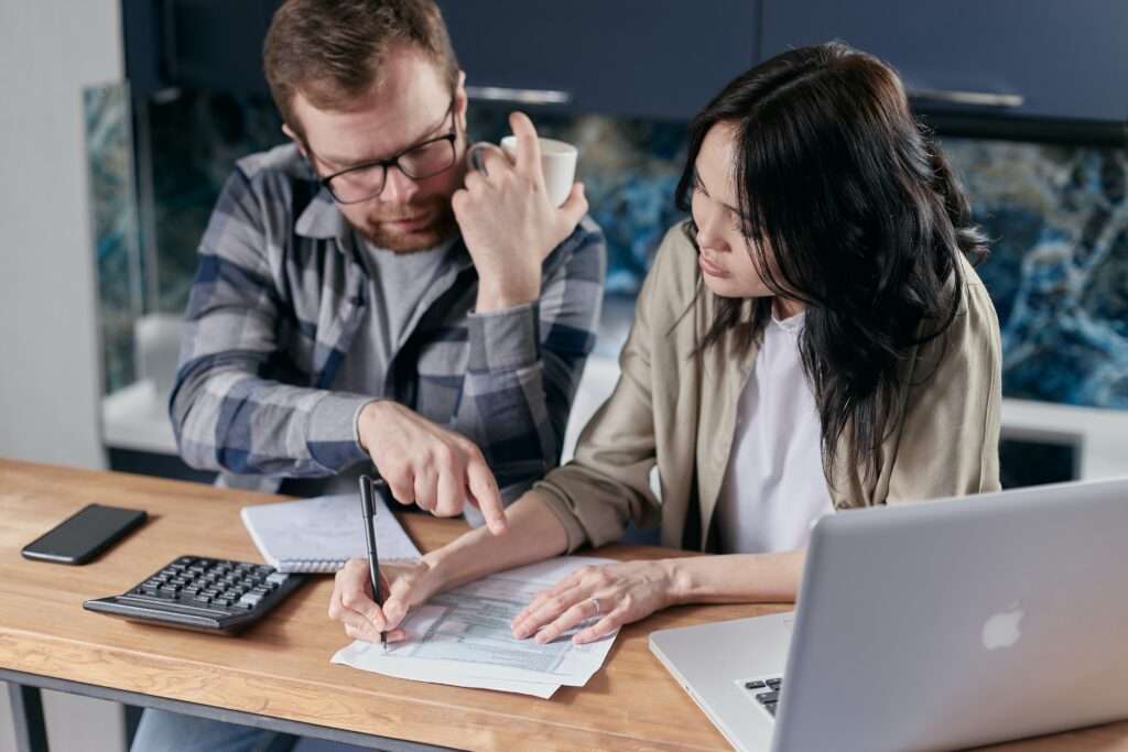Two individuals talking about Credit Scores 